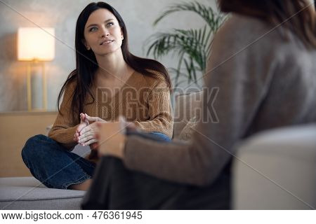 Psychologist Session. A Middle Aged Woman In Therapy With An Woman Psychologist.