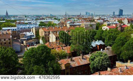 Riga Cityscape Spring Aerial Top View Video, Town, Latvia. Sunny Day Building Rooftops. Riga Skyline