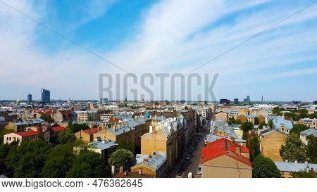 Riga Cityscape Spring Aerial Top View Video, Town, Latvia. Sunny Day Building Rooftops. Riga Skyline