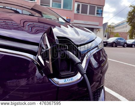 Paris, France - Sep 18, 2022: A Black Cable Is Connecting A New Renault Car To An External Charger, 