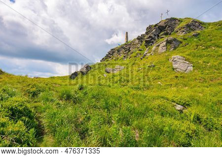 Rocky Formations On The Steep Grassy Slopes Of Pikui Mountain. Nature Scenery Of Ukrainian Carpathia