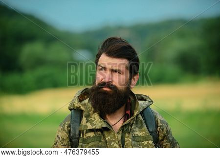 Middle Aged Farmer, Closeup Male Farmer Portrait. Portrait Of Middle Aged Bearded Man, Outdoors In M