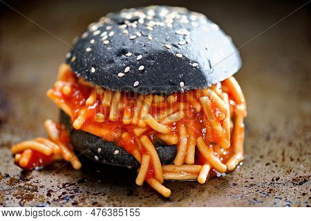 Close Up Of Charcoal Bun Spaghetti Sandwich