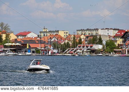 Mikolajki, Poland, May 14: View To City From The Lake On May 14, 2023 At Mikolajki, Poland. Mikolajk