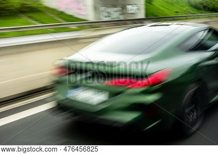 Ostrava, Czech Republic - May 3, 2023: Green Bmw 8-series Coupe Speeding Extremely With Strong Motio