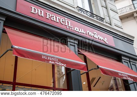Lyon , Aura France - 04 27 2023 : Dp...am Du Pareil Au Même Red Sign Text And Brand Logo Facade Entr