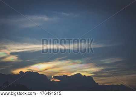 A Rare Look At An Iridescent Cloud. Fire Rainbows Or Rainbow Clouds. Iridescent Pileus Cloud Colorfu