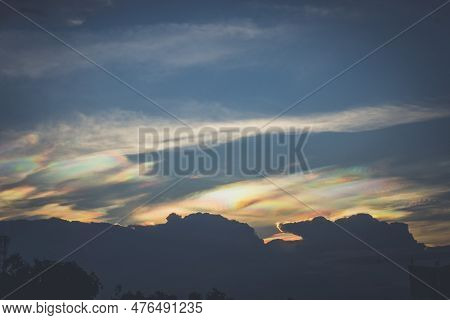 A Rare Look At An Iridescent Cloud. Fire Rainbows Or Rainbow Clouds. Iridescent Pileus Cloud Colorfu