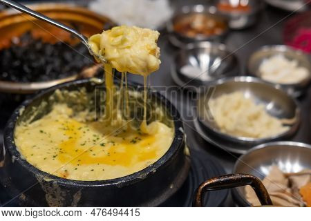 Steamed Egg Or Gyeran Jjim With Cheese Served In A Bowl. Korean Food
