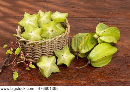Star Fruit Or Carambola Green - Averrhoa Carambola; Photo On Wooden Background