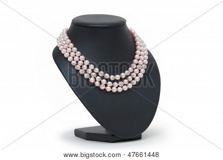 Pearl Necklace On Black Mannequin Isolated