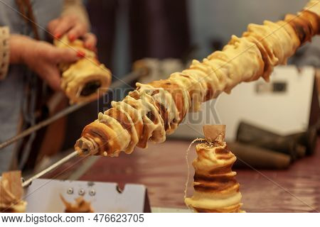 A French Spit Cake Made With Layers Of Batter Deposited, One At A Time, Onto A Rotating Spit Cooked 