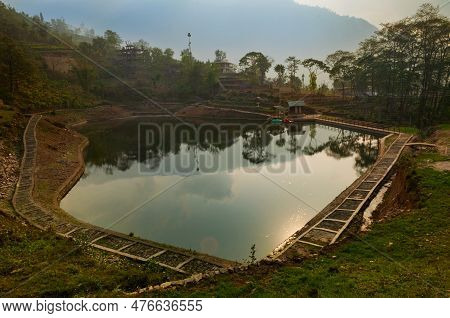 Sun Reflection On Water Of Chayatal Or Chaya Taal, West Sikkim, India, Famous For Reflection Of Snow