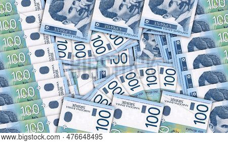 Serbia Dinar Banknotes In A Cash Fan Mosaic Pattern. Serbian Rsd 100 Money Notes. Abstract Concept O