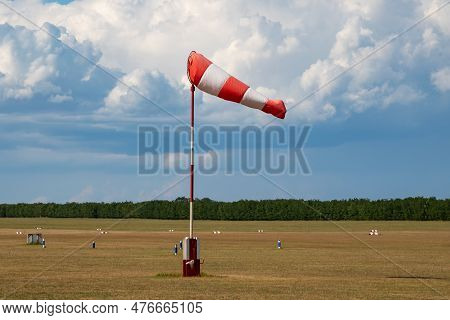 Airport Wind Sock. Strong Wind And Bad Weather Symbol. Climate Change. Meteorology Forecast. Storm I