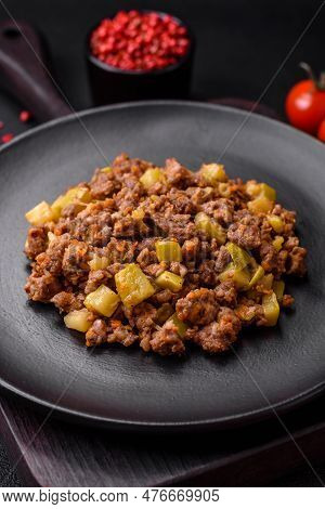 Tasty Dish Consisting Of Zucchini, Beef Meat, Mushrooms, Onions And Garlic