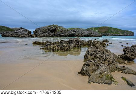 View On Playa De Borizo In Celorio, Green Coast Of Asturias, North Spain With Sandy Beaches, Cliffs,