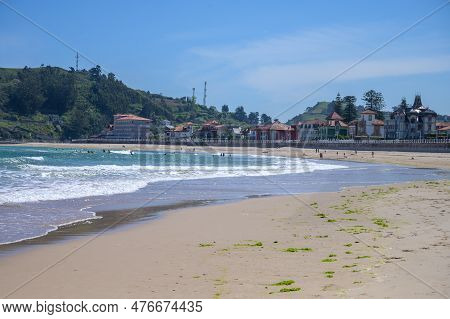 View On Playa De Ribadesella, Green Coast Of Asturias, North Spain With Sandy Beaches, Cliffs, Hidde