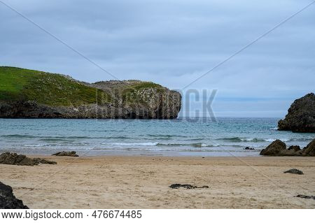 View On Playa De Borizo In Celorio, Green Coast Of Asturias, North Spain With Sandy Beaches, Cliffs,
