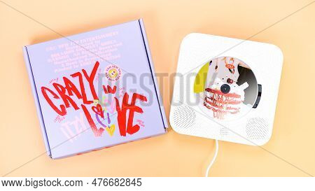K-pop Group Itzy Crazy In Love 1St Album On Yellow Background. Special Edition Music Cd. South Korea