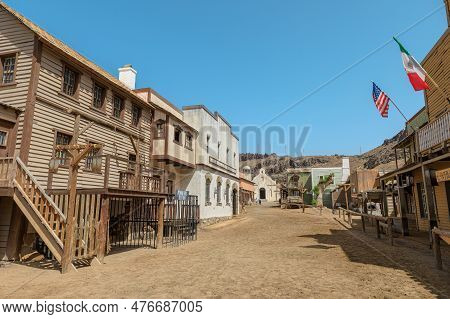 Sioux City Park, Gran Canaria - April 2023: The Saloon With American Flag And Mexican Flag. Main Str