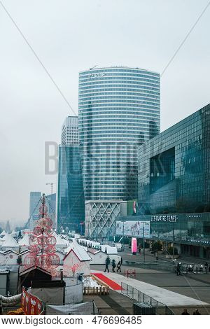 Paris, France - Dec 3, 2014: The Vibrant Skyline Of Paris Business District Is Marked By The Iconic 