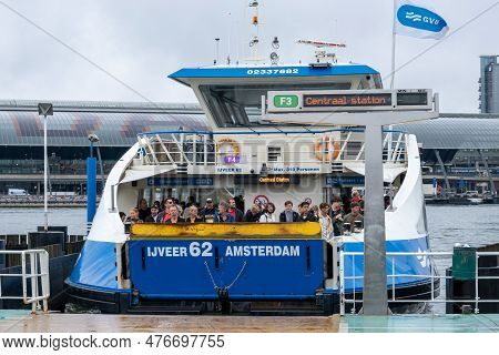 Amsterdam, The Netherlands - 8 September 2022: People Inside A Gvb Ferryboat
