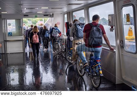 Amsterdam, The Netherlands - 8 September 2022: People Inside A Gvb Ferryboat