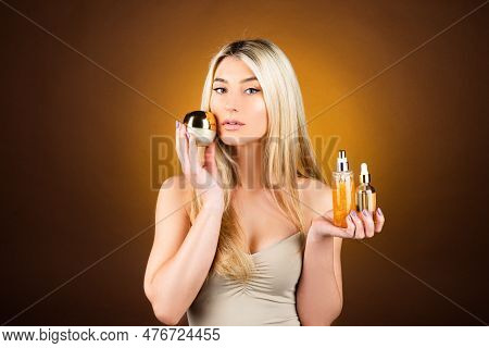 Perfume Bottle. Woman With Spray Aroma Perfume. Woman Holding A Perfumes Bottle. Beautiful Girl Usin
