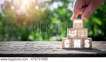 Cms, Content Management System Concept, Person Hand Holding Wooden Block With Content Management Sys