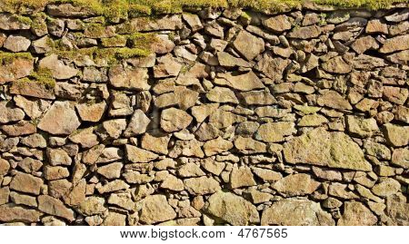 Old Stone Wall With Moss