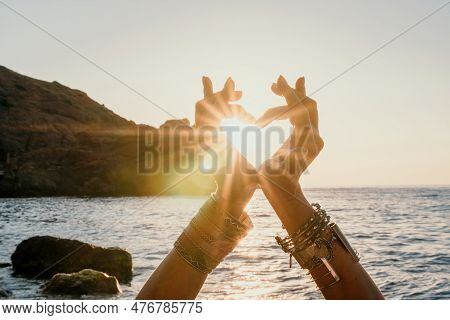 Woman Sea Yoga. Happy Woman In White Swimsuit And Boho Style Braclets Practicing Outdoors On Yoga Ma