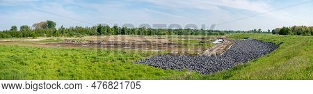 Extra Large Panorama Over Grass, Natural Flood Are And Rocks Near The River Scheldt, Tielrode, Fland