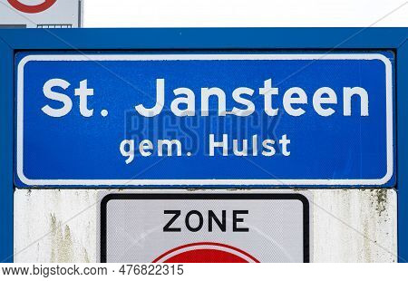 Sint-jansteen, Zeeland, The Netherlands - May 21, 2023 - Blue Road Sign Of The Village Of Saint Jans
