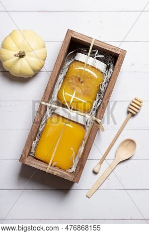 Set Of Jars With Honey And Nuts Honey In Wooden Box Top View, Flat Lay