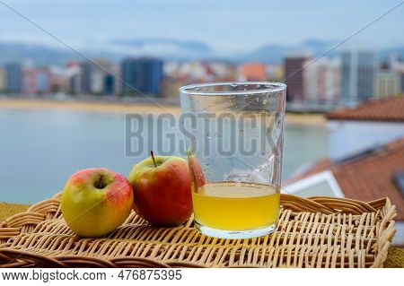 Traditional Natural Asturian Cider Made From fermented Apples In Wooden Barrels Should Be Poured Fro