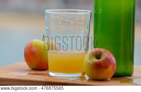 Traditional Natural Asturian Cider Made From fermented Apples In Wooden Barrels Should Be Poured Fro
