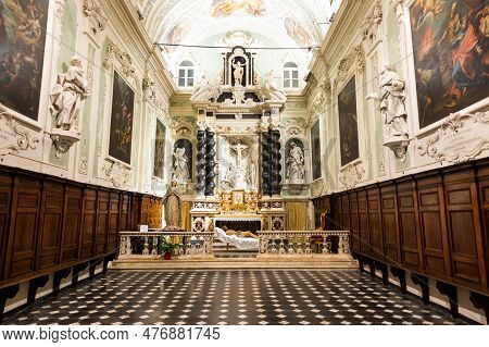 Ventimiglia, Italy - August 2022: The Baroque Church Interior Of Oratorio Dei Neri With Jesus Christ