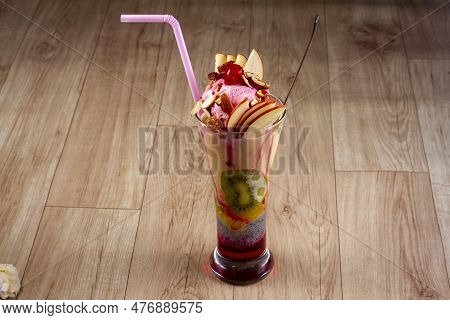 Mixed Fruit Ice Cream Or Falooda On Wooden Background