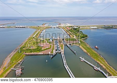 Aerial View Dutch Sluices Kornwerderzand Between Ijsselmeer And Wadden Sea In The Netherlands