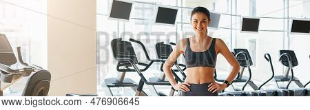 Ready For Workout Full Legth Of Deautiful And Sporty Woman In Sportswear Is Keeping Hands On Her Hip