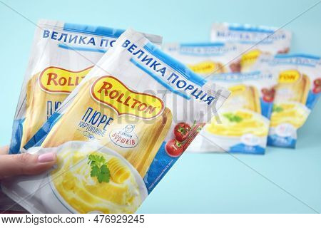 Rollton Instant Mashed Potatoes On A Blue Background. Fast Food, Junk Food.