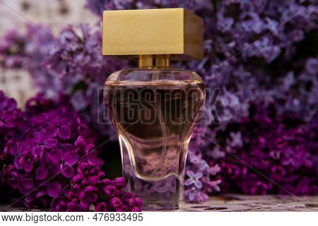 Perfume Among Lilac Flowers,  A Bottle Of Perfume Among The Flowers