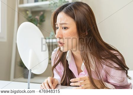 Dermatology, Expression Face Worry Asian Young Woman Looking Mirror Hand Touch Facial At Dark Spot O