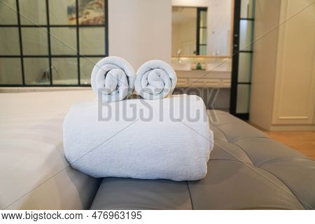 Close Up Selective Focus Soft Neat White Towel In The Hotel Luxury Bedroom