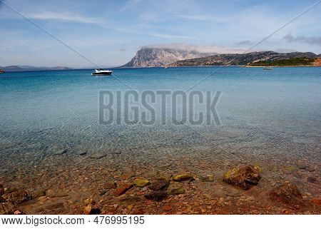 The Sea Of Capo Coda Di Cavallo, In Background The Island Of Tavolara
