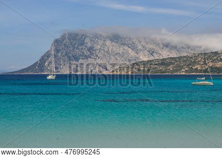 The Sea Of Capo Coda Di Cavallo, In Background The Island Of Tavolara