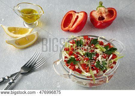 Esh Summer Salad Of Young Cabbage And Bell Peppers With Sesame Seeds, Dressed With Olive Oil And Lem