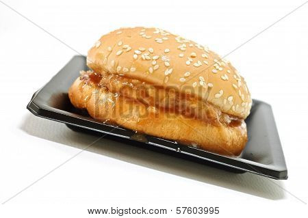 Homemade hamburger on a plate isolated