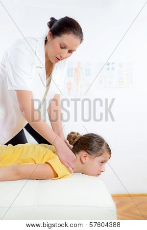 Femile Chiropractor doing adjustment on female patient
